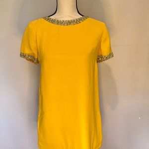 Vintage bright yellow cropped dress with metallic detail and the back is ❤️